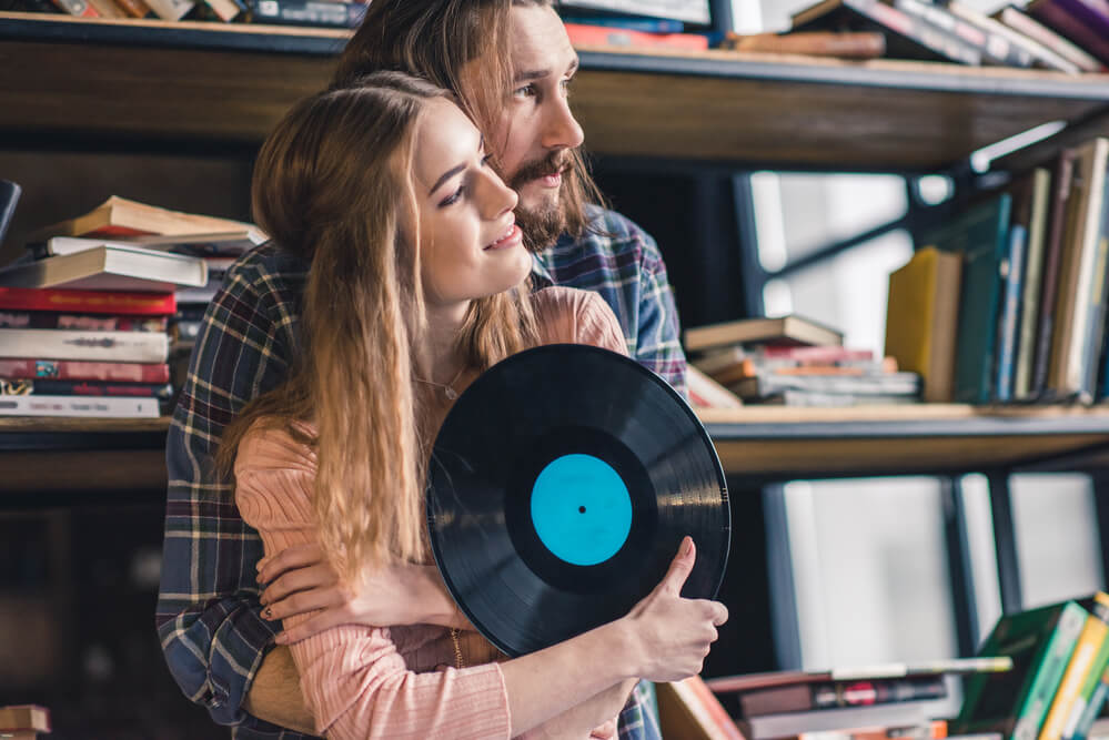 couple holding a vinyl