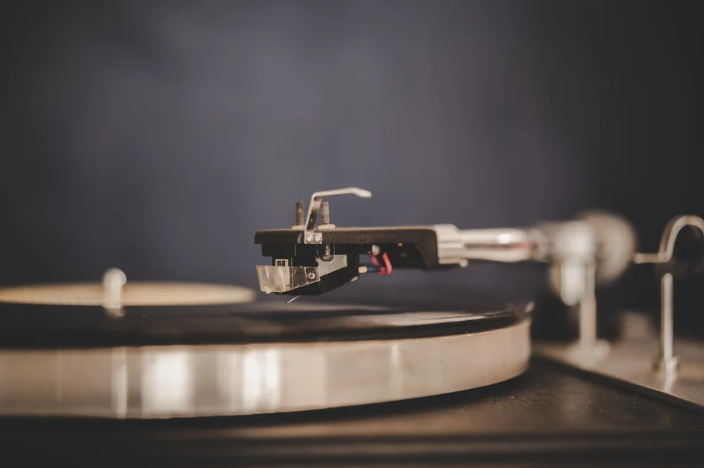 Spinning Record Player With Vintage Vinyl, Turntable Player And Vinyl Record.