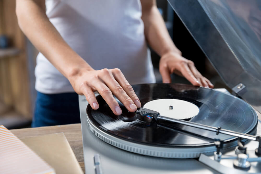 woman using a turntable